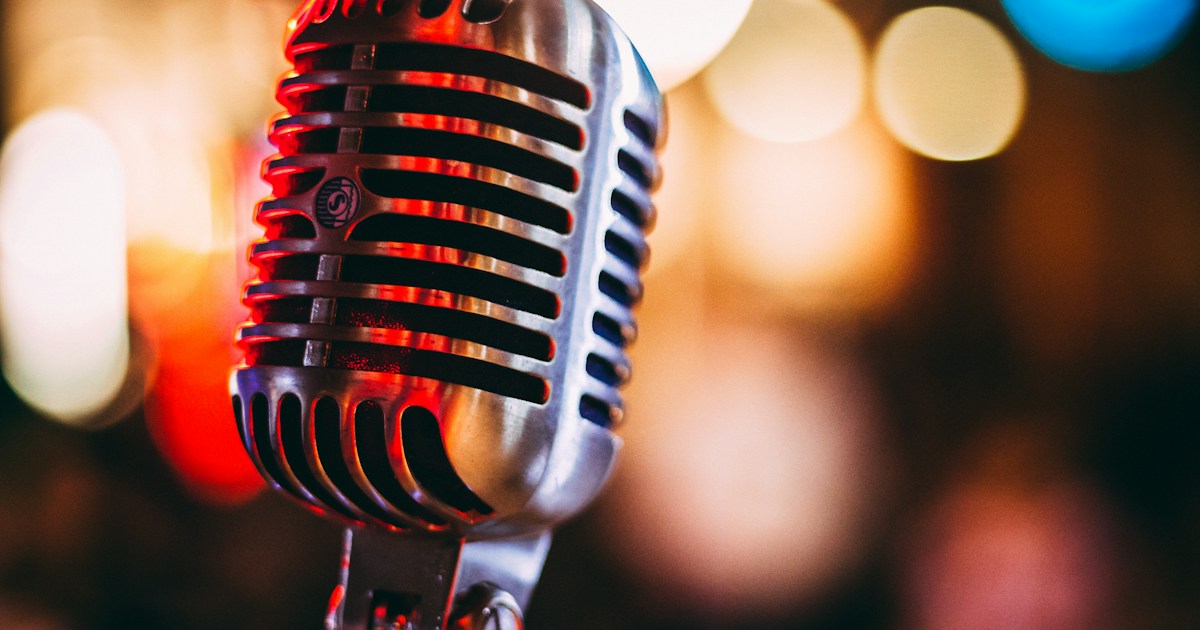 bokeh photography of condenser microphone