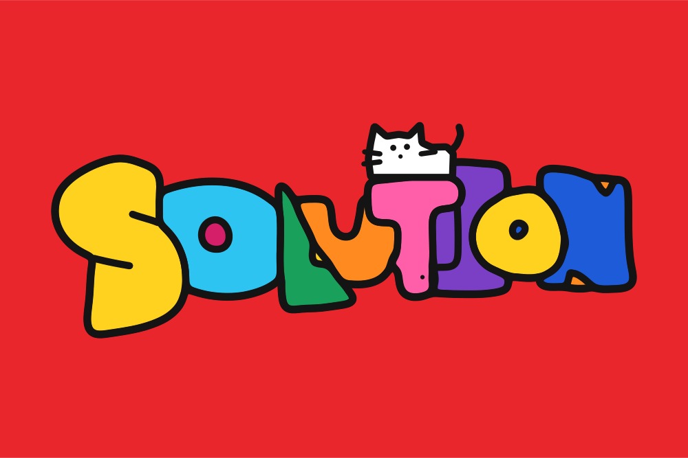 赤い背景に、猫を載せたカラフルなSOLUTIONのブロック文字